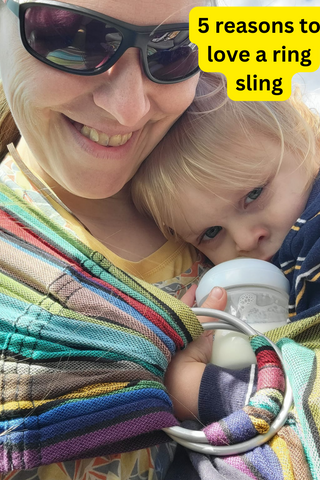 Mom wears her baby in a Carousel of Colors ring sling, available from Mama & Roo's. Baby is holding  bottle and mom is wearing sunglasses. Text reads, "5 reasons to love a ring sling"