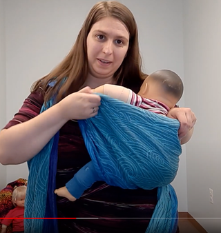 Screenshot from Robin's Hip Carry video by Mama & Roo's