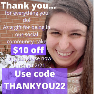 Mama & Roo's Founder Alexandra smiles in a selfie in the snow wearing her Snood scarf. Text reads, "Thank you... for everything you do! As a gift to our social community, take $10 off any purchase now through 2/21. Use code THANKYOU22"