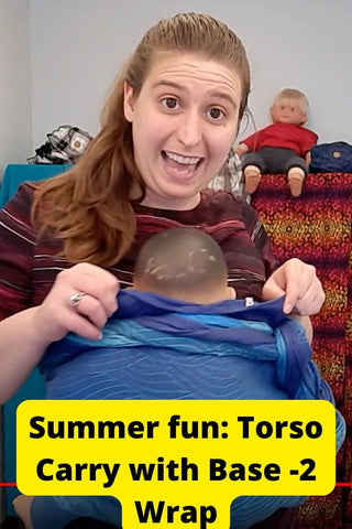 White woman wraps Asian demo doll in a video screenshot in a Front Torso Carry in a long woven wrap. Text reads, "Summer fun: Torso Carry with Base -2 Wrap"