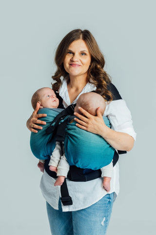 LennyTwin twin carrier and hip sling in the airglow design
