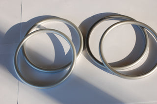 Silver sling rings compared to slate sling rings