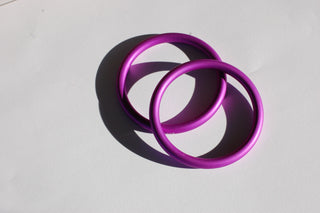 small purple sling rings